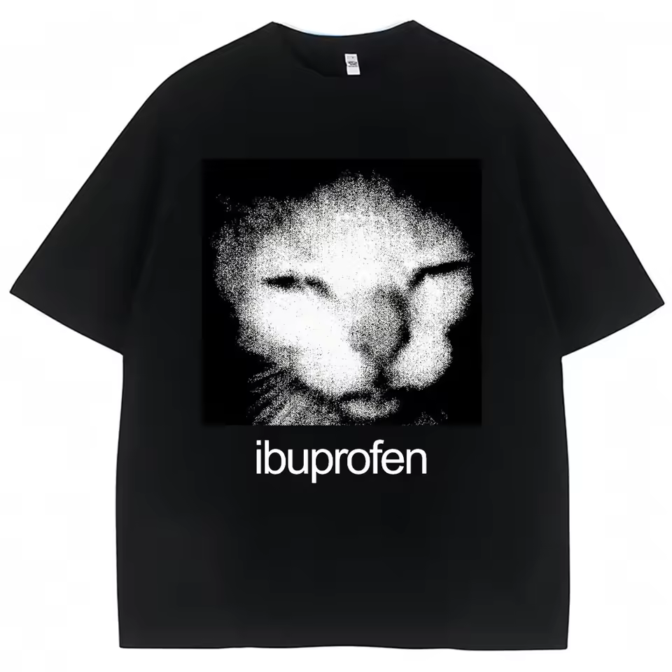 a shirt with a high contrast black&white cat that looks like it's squinting as if it has a headache, with the text "ibuprofen" under it