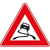 a triangular traffic sign with a red rim, categorising it as a warning, with a car facing towards you with tracks crossing over each other